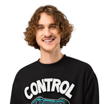 Model wearing a black pullover gamer programmer sweatshirt featuring a "Control Freak" coding humor graphic - Cozy Geek Sweatshirts