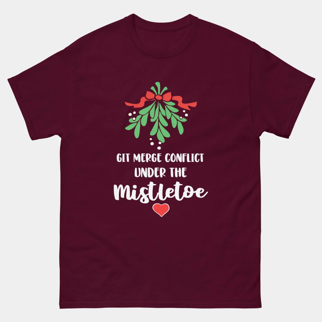 Maroon Funny Programmer Holiday Tee featuring a mistletoe graphic and the text: "GIT MERGE CONFLICT UNDER THE MISTLETOE". This is a Funny Git Programmer Holiday Shirt.