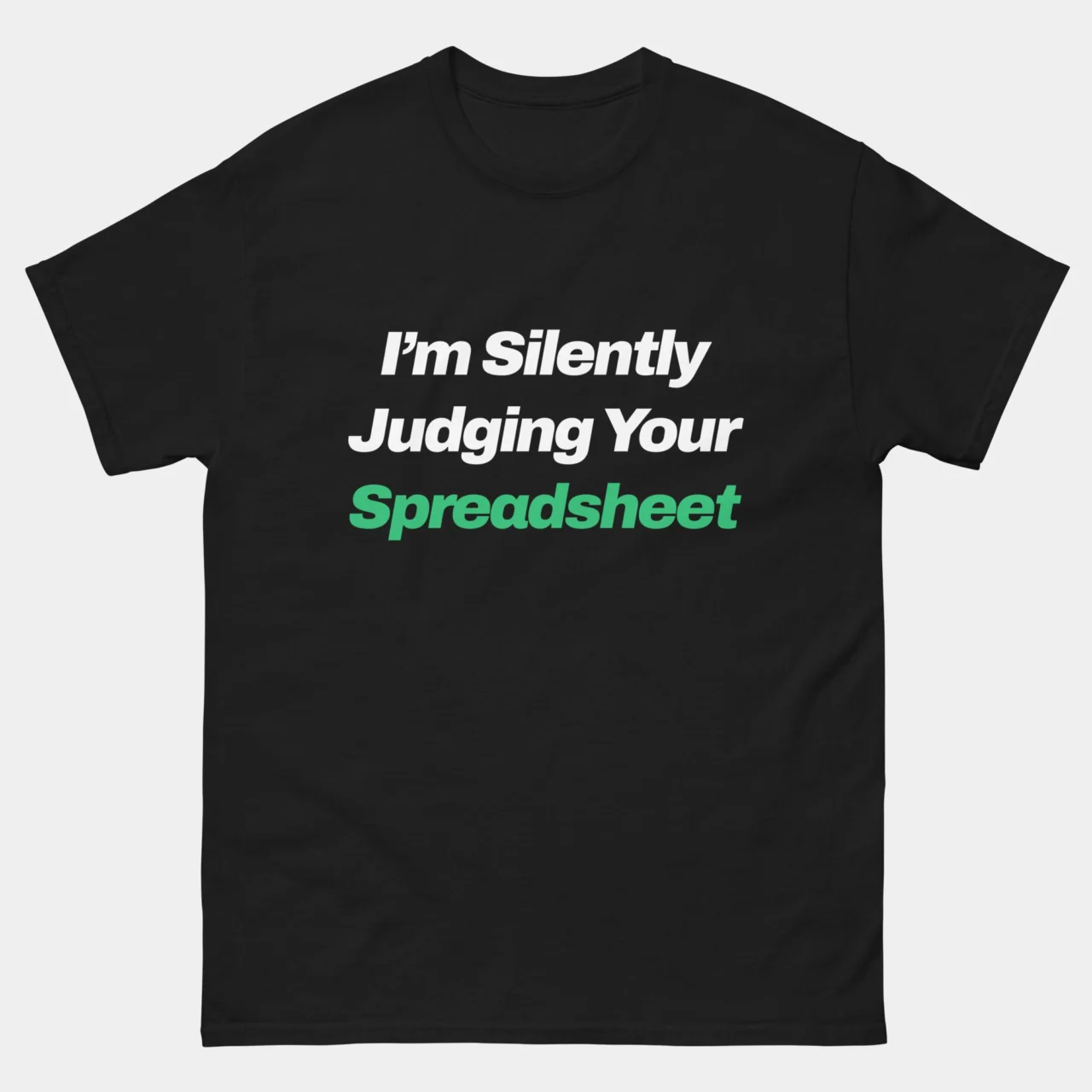 A black Funny Data Analyst Sarcasm Tee with the text "I'm Silently Judging Your" in white and "Spreadsheet" in green. This is a Funny Sarcastic Silently Judging Your Spreadsheet T-Shirt