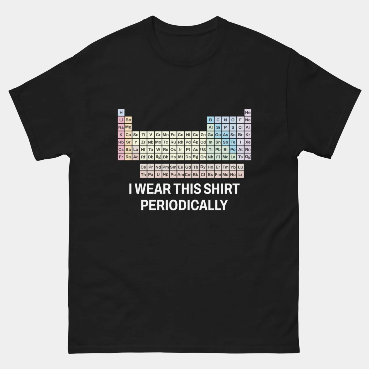 Black funny I Wear This Shirt Periodically T-Shirt featuring a full color periodic table of elements above bold text reading I Wear This Shirt Periodically, science pun humor graphic tee for chemistry teachers and STEM lovers