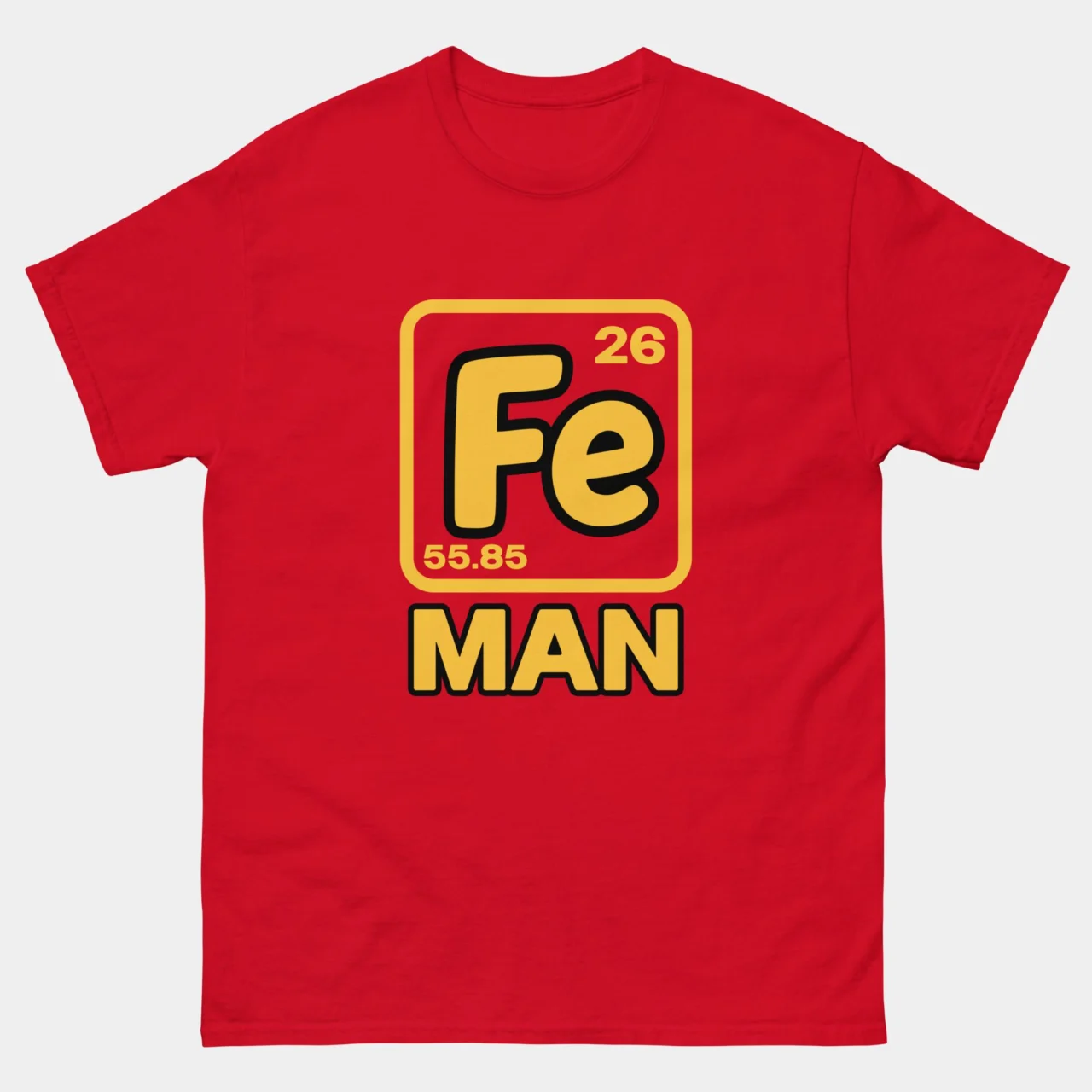 Red Fe Man Funny Iron Element Chemistry Tee featuring a large periodic element tile with symbol Fe atomic number 26 and atomic weight 55.85 labeled Coffee above bold text reading MAN, creating the Iron Man chemistry pun, science geek humor graphic tee