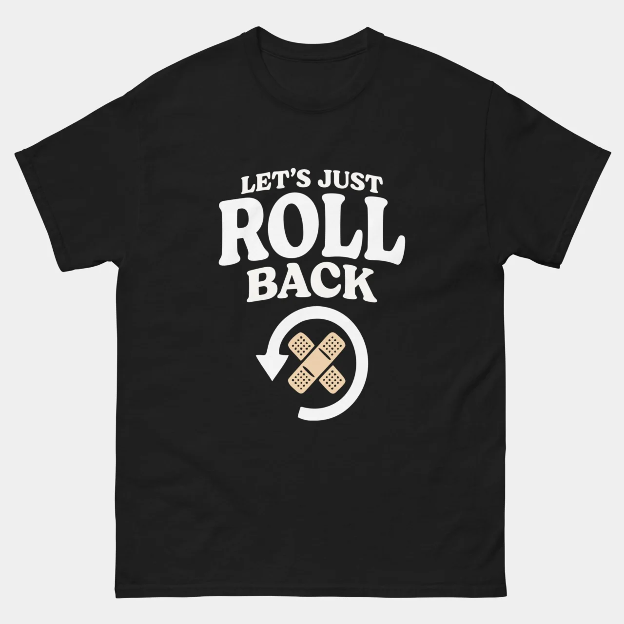 Black Let's Just Roll Back Funny DevOps Shirt with bold retro text reading Let's Just Roll Back above a circular rollback arrow icon containing two crossed bandages, deployment and production incident humor graphic tee for DevOps engineers and SREs