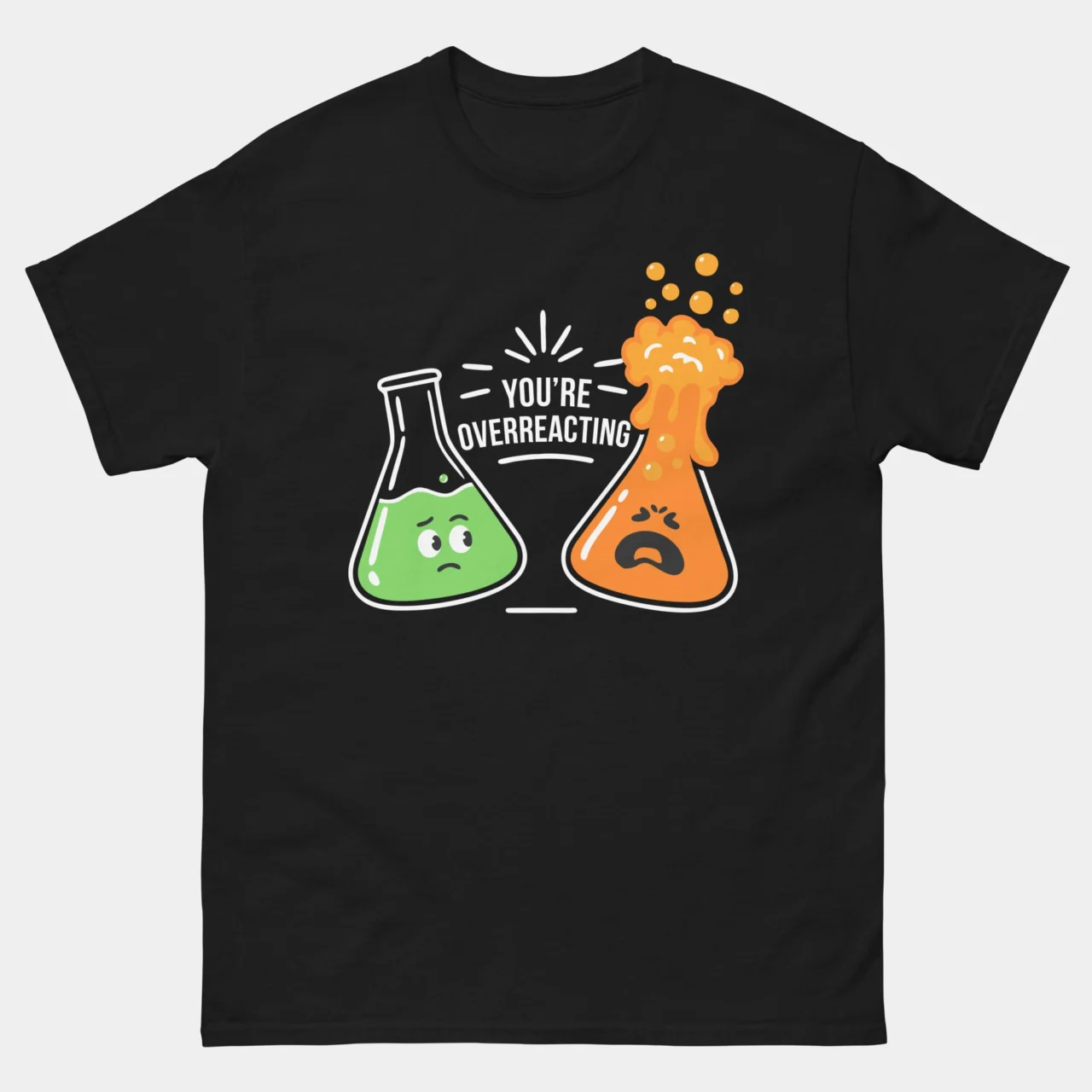 Black You're Overreacting Funny Chemistry Shirt showing two cartoon flasks, one calm green flask and one erupting orange flask, above text reading You're Overreacting, sarcastic chemical reaction pun graphic tee