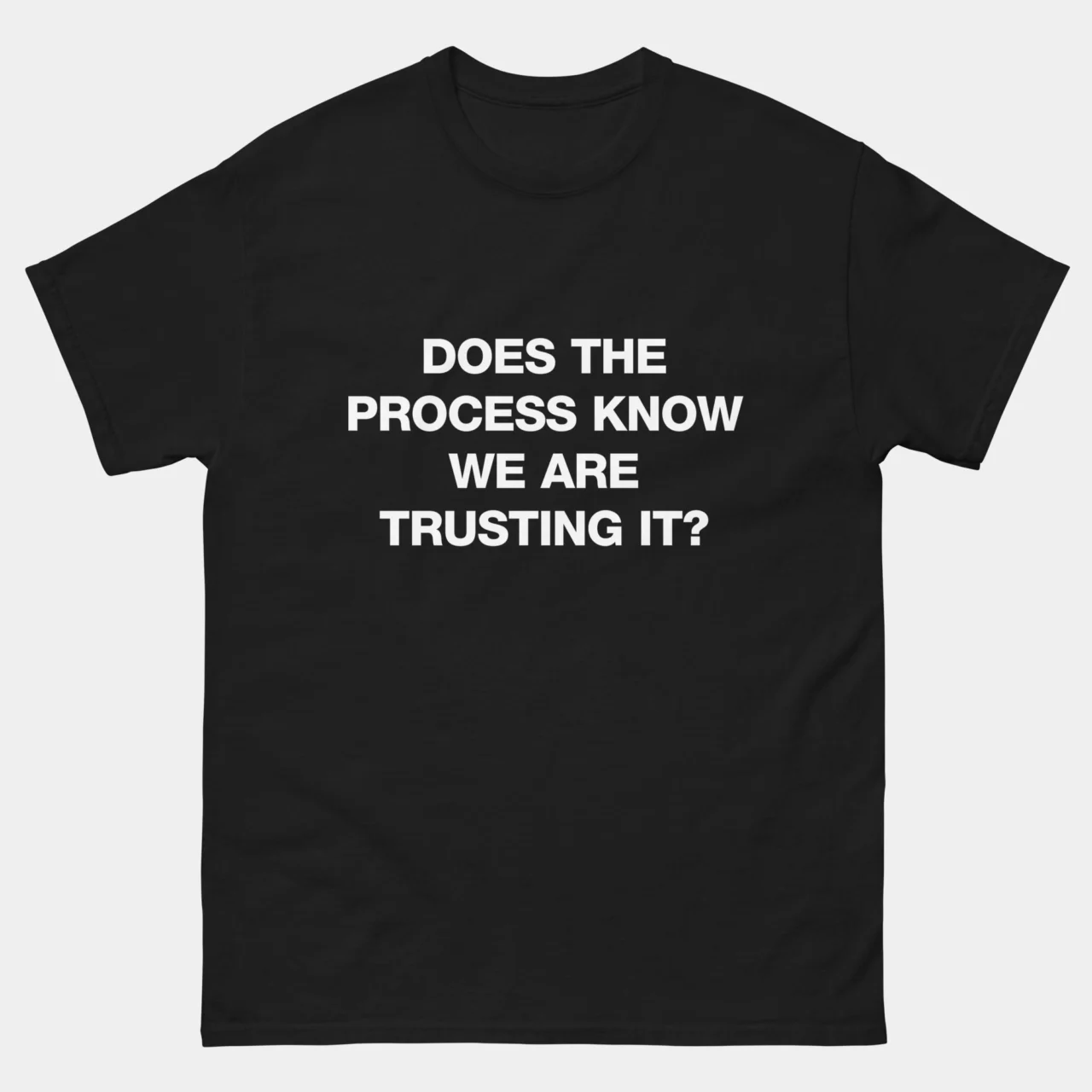 Black Funny Process Meme T-Shirt with bold white text reading Does The Process Know We Are Trusting It, a funny office and corporate humor meme